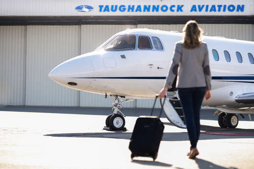Woman taking charter jet flight at Flytac